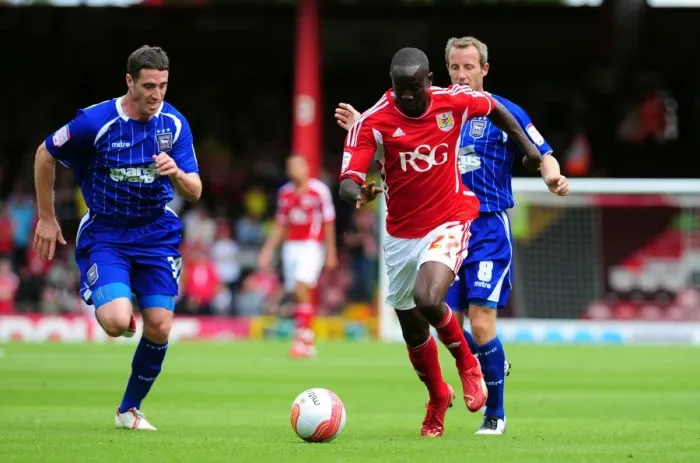 Framed Print : Adomah Outmaneuvers Kennedy: A Pivotal Moment in the 2011 Championship Clash Between Bristol City and Ipswich Town Framed Print : Adomah Outmaneuvers Kennedy: A Pivotal Moment in the 2011 Championship Clash Between Bristol City and Ipswich Town