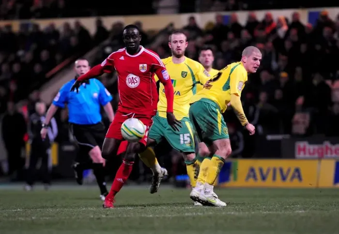 Framed Print : Adomah Outmaneuvers Tierney: Norwich City vs. Bristol City Championship Clash (14-03-2011) Framed Print : Adomah Outmaneuvers Tierney: Norwich City vs. Bristol City Championship Clash (14-03-2011)