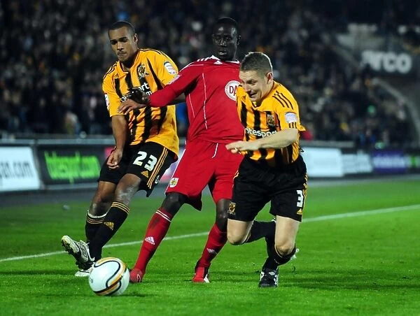 Adomah Slips Past Simpson and Dawson: Hull City vs. Bristol City Championship Clash (18 / 12 / 2010)