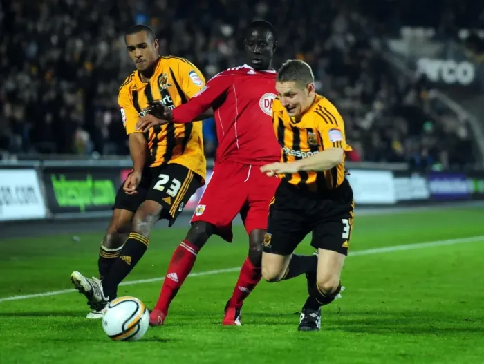 Framed Print : Adomah Slips Past Simpson and Dawson: Hull City vs. Bristol City Championship Clash (18 / 12 / 2010) Framed Print : Adomah Slips Past Simpson and Dawson: Hull City vs. Bristol City Championship Clash (18 / 12 / 2010)