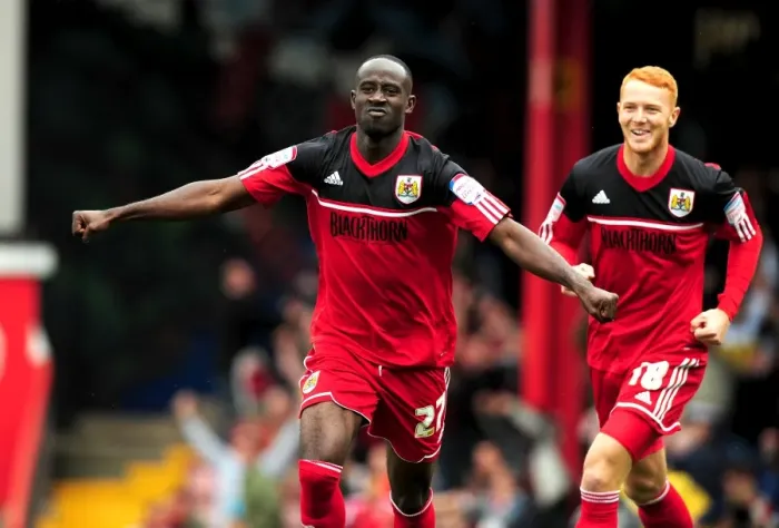 Framed Print : Adomah and Taylor in Glory: Thrilling Moment of Bristol City's Championship Victory Framed Print : Adomah and Taylor in Glory: Thrilling Moment of Bristol City's Championship Victory