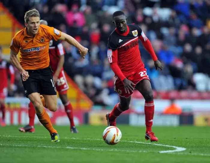 Framed Print : Adomah vs. Berra: Intense Battle for Possession in Bristol City vs. Wolverhampton Wanderers Championship Clash, December 2012 Framed Print : Adomah vs. Berra: Intense Battle for Possession in Bristol City vs. Wolverhampton Wanderers Championship Clash, December 2012