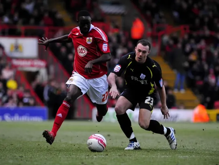 Framed Print : Adomah vs Blake: Intense Battle for Control in the 2011 Championship Clash between Bristol City and Cardiff City Framed Print : Adomah vs Blake: Intense Battle for Control in the 2011 Championship Clash between Bristol City and Cardiff City