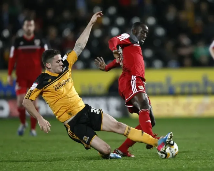 Framed Print : Adomah vs Brady: Intense Battle in the Championship Clash between Hull and Bristol City, 2013 Framed Print : Adomah vs Brady: Intense Battle in the Championship Clash between Hull and Bristol City, 2013