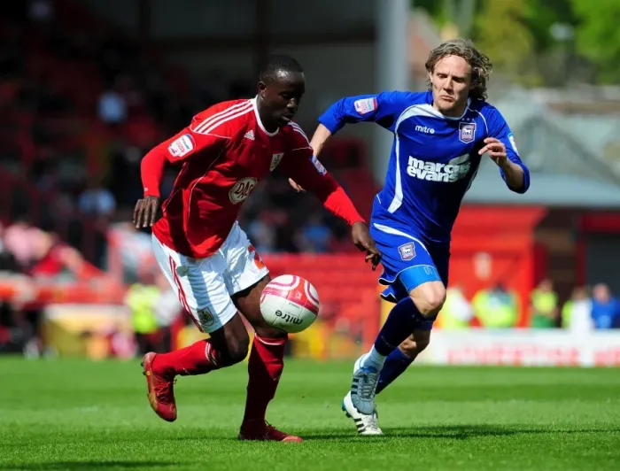 Framed Print : Adomah vs Bullard: Intense Battle for Control in the Championship Clash between Bristol City and Ipswich Town (16-04-2011) Framed Print : Adomah vs Bullard: Intense Battle for Control in the Championship Clash between Bristol City and Ipswich Town (16-04-2011)
