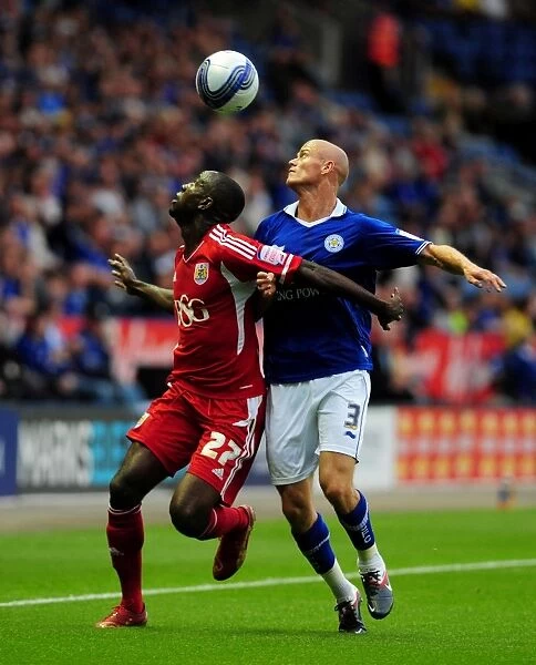 Adomah vs. Konchesky: Intense Battle for the Ball in Leicester City vs. Bristol City Championship Clash (August 2011)