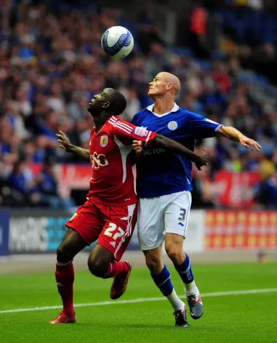 Framed Print : Adomah vs. Konchesky: Intense Battle for the Ball in Leicester City vs. Bristol City Championship Clash (August 2011) Framed Print : Adomah vs. Konchesky: Intense Battle for the Ball in Leicester City vs. Bristol City Championship Clash (August 2011)