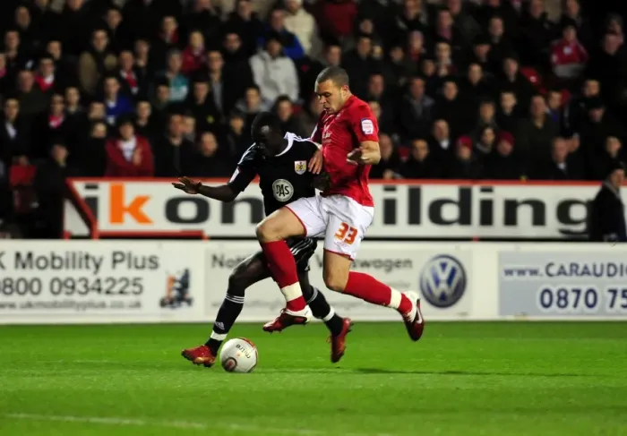 Framed Print : Adomah vs. Lynch: Intense Battle for Ball Possession during Forest vs. Bristol City Championship Clash, January 2011 Framed Print : Adomah vs. Lynch: Intense Battle for Ball Possession during Forest vs. Bristol City Championship Clash, January 2011