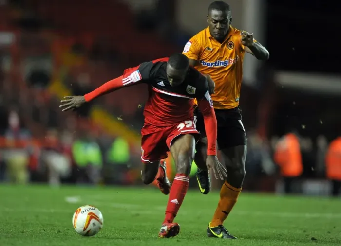 Framed Print : Adomah vs. Nouble: Intense Battle for Possession in Bristol City vs. Wolverhampton Wanderers Championship Clash Framed Print : Adomah vs. Nouble: Intense Battle for Possession in Bristol City vs. Wolverhampton Wanderers Championship Clash