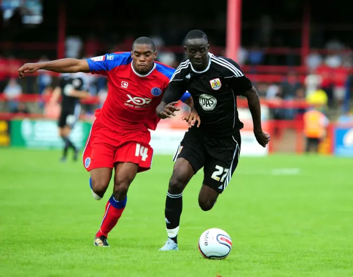 Framed Print : Adomah vs. Panther: Intense Battle for Ball Possession (Aldershot vs. Bristol City)