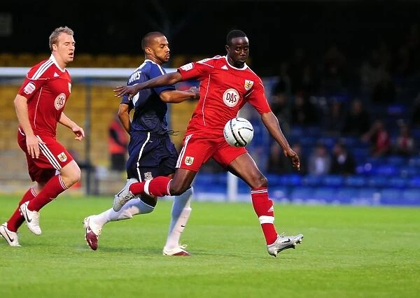 Adomah vs Soares: Battle for the Ball in the Carling Cup Clash between Southend United and Bristol City (10-08-2010)