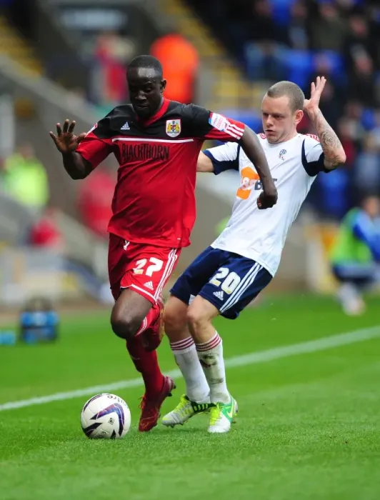 Framed Print : Adomah vs Spearing: Intense Battle for Ball Possession in Bolton Wanderers vs Bristol City Championship Clash Framed Print : Adomah vs Spearing: Intense Battle for Ball Possession in Bolton Wanderers vs Bristol City Championship Clash