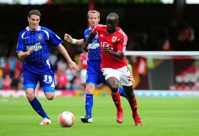 Framed Print : Adomah's Agile Maneuver: A Turning Point in the 2011 Championship Battle between Bristol City and Ipswich Town (Albert Adomah outsmarts Mark Kennedy) Framed Print : Adomah's Agile Maneuver: A Turning Point in the 2011 Championship Battle between Bristol City and Ipswich Town (Albert Adomah outsmarts Mark Kennedy)
