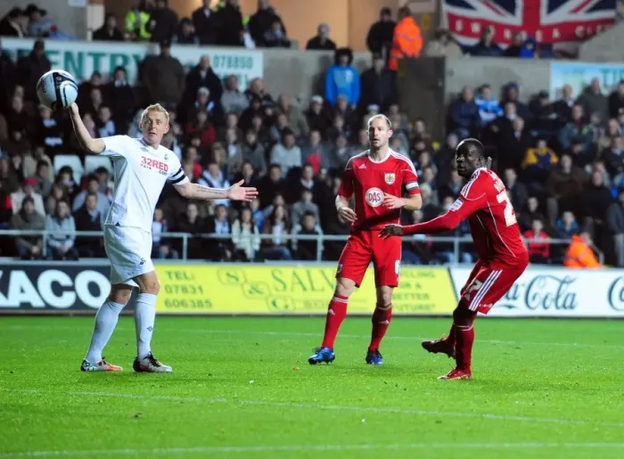 Framed Print : Adomah's Heart-Stopping Header: Swansea City vs. Bristol City, Championship 2010