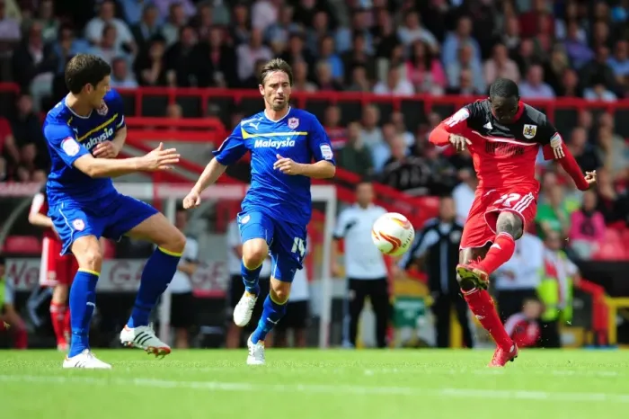 Framed Print : Adomah's Shot at Ashton Gate: Bristol City vs. Cardiff City Championship Clash, 2012