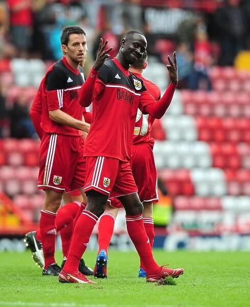 Adomah's Thrilling Goal: A Memorable Moment with Louis Carey at Ashton Gate (August 4, 2012)