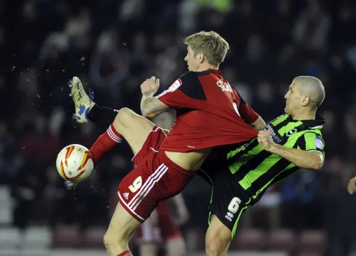 Framed Print : Aerial Clash: Jon Stead vs Adam El-Abd - Bristol City vs Brighton & Hove Albion Framed Print : Aerial Clash: Jon Stead vs Adam El-Abd - Bristol City vs Brighton & Hove Albion