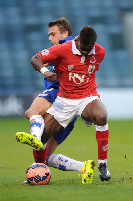 Framed Print : Agard vs Loft: Intense Battle at Priestfield Stadium - FA Cup Round One, Gillingham vs Bristol City Framed Print : Agard vs Loft: Intense Battle at Priestfield Stadium - FA Cup Round One, Gillingham vs Bristol City