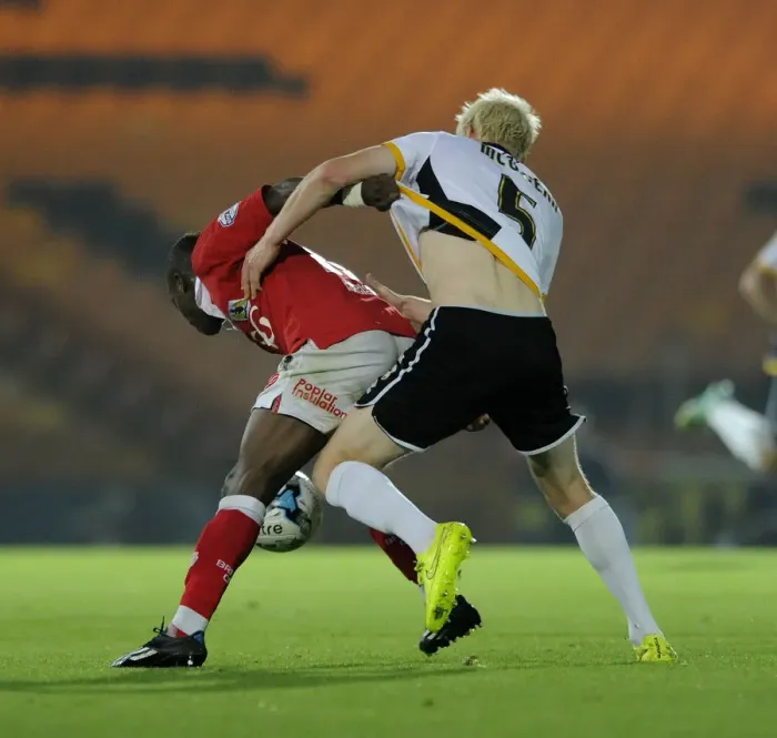 Framed Print : Agard vs McGivern: Intense Battle for Ball Possession during Port Vale vs Bristol City Football Match, September 16, 2014