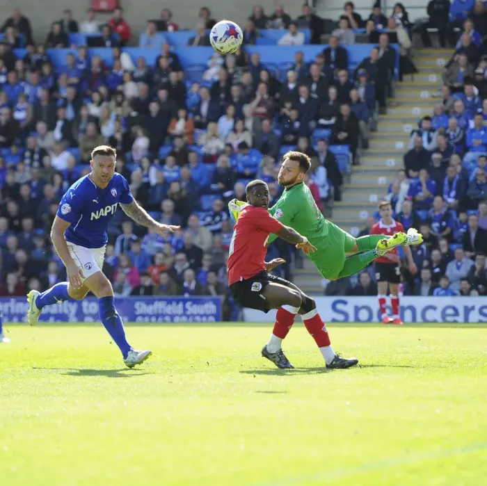 Framed Print : Agard's Goal Attempt Denied by Lee in Chesterfield vs. Bristol City Clash