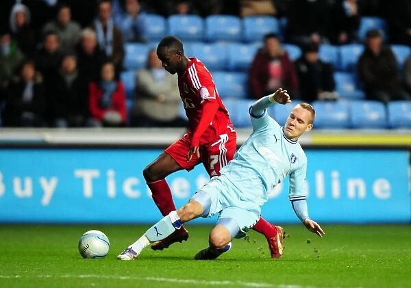 Albert Adomah Drives Past Coventry Defense: Coventry City vs. Bristol City, Championship Football Match, December 2011