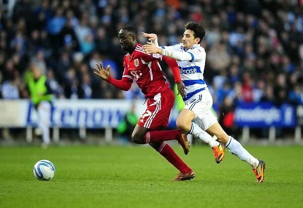Albert Adomah Fouled by Jem Karacan in Championship Clash between Reading and Bristol City - 28 / 01 / 2012
