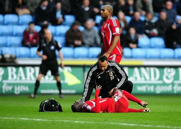 Albert Adomah Receives Penalty Area Treatment During Coventry City vs. Bristol City Championship Match, 26 / 12 / 2011