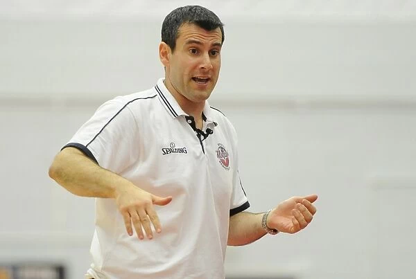 Andreas Kapoulas Leads the Charge: Intense Basketball Action between Bristol Flyers and Plymouth Raiders
