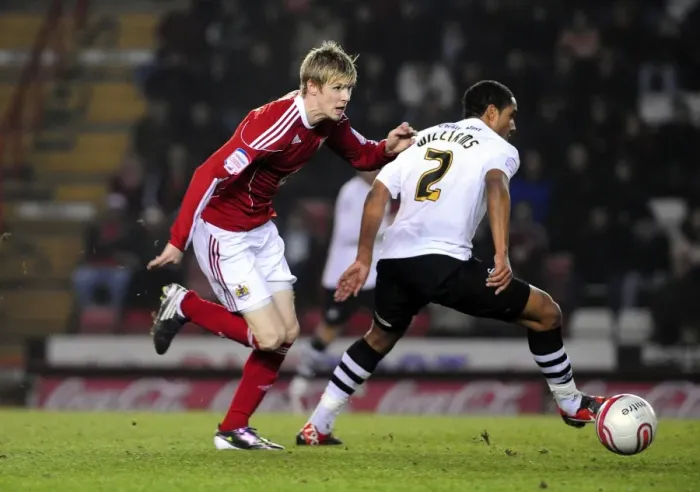 Framed Print : Andy Keogh Darts Past Ashley Williams: A Pivotal Moment in the 2011 Championship Clash Between Bristol City and Swansea City