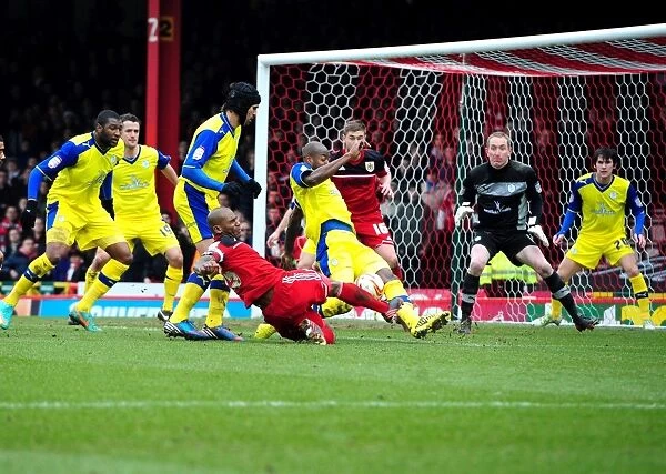 Anthony Gardner Blocks Marvin Elliott's Goal Attempt: A Pivotal Moment in Bristol City vs. Sheffield Wednesday (Npower Championship, 01 / 04 / 2013)
