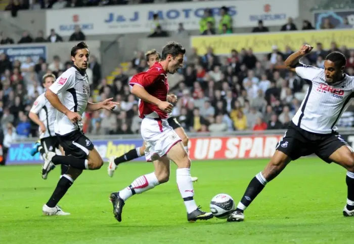 Framed Print : Ashley Williams Tackles Ivan Sproule: Intense Moment from Swansea City vs. Bristol City Framed Print : Ashley Williams Tackles Ivan Sproule: Intense Moment from Swansea City vs. Bristol City