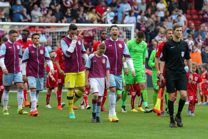 Framed Print : Aston Villa Captain Tommy Elphick's Surprised Reaction to Bristol City's New Lansdown Stand at Ashton Gate