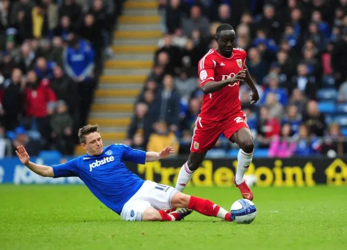 Framed Print : Avoiding the Tackle: Albert Adomah Evades Scott Allan in Portsmouth vs. Bristol City Clash Framed Print : Avoiding the Tackle: Albert Adomah Evades Scott Allan in Portsmouth vs. Bristol City Clash