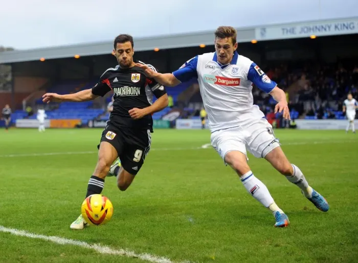 Framed Print : Baldock and Taylor in Pursuit: Intense Action from Tranmere vs. Bristol City, League One Football Match