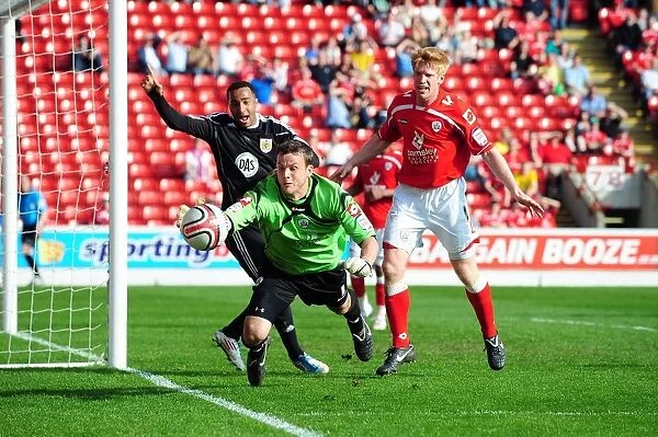 Barnsley Goalkeeper Luke Steele Struggles to Keep Ball in Championship Clash vs. Bristol City (09 / 04 / 2011)