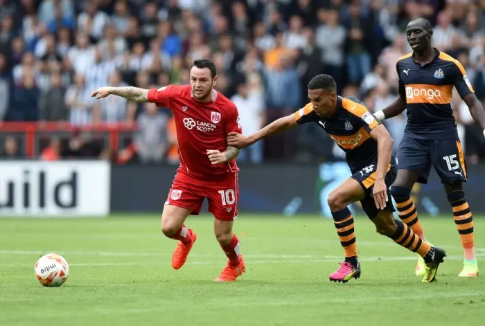 Framed Print : A Battle for Possession: Lee Tomlin vs Isaac Hayden Framed Print : A Battle for Possession: Lee Tomlin vs Isaac Hayden