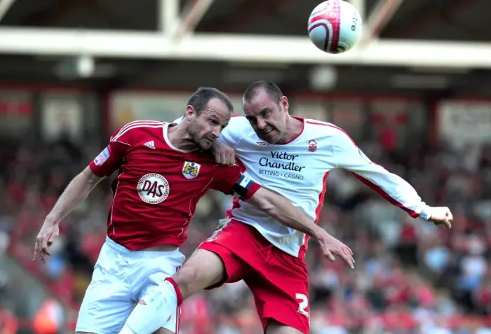 Framed Print : Battle for Supremacy: Louis Carey vs. Kris Boyd - Championship Showdown at Ashton Gate, 25th April 2011