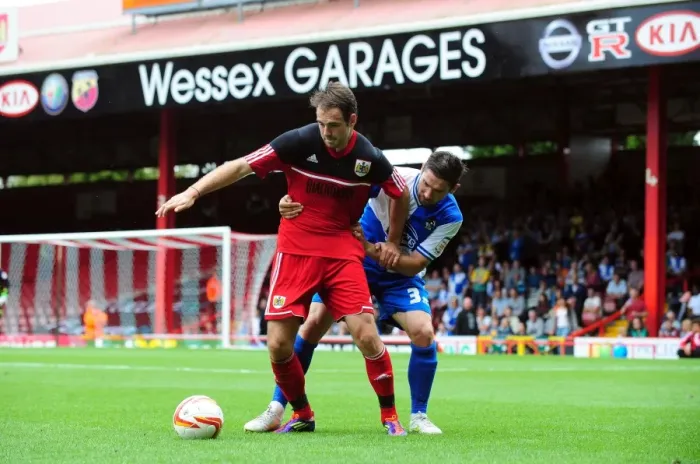 Framed Print : Battling for the Ball: Brett Pitman vs. Jim Paterson - Bristol City vs. Bristol Rovers, 2012 (Louis Carey Testimonial)
