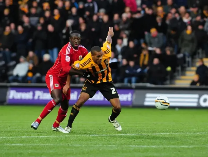 Framed Print : Battling for the Ball: Damion Stewart vs. Jay Simpson - 2010 Championship Clash between Hull City and Bristol City Framed Print : Battling for the Ball: Damion Stewart vs. Jay Simpson - 2010 Championship Clash between Hull City and Bristol City