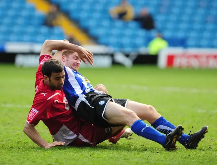 Framed Print : Battling for the Ball: Fontaine vs. O'Connor in the Intense Championship Clash between Sheffield Wednesday and Bristol City (16th March 2010)