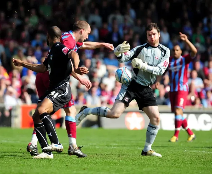 Framed Print : Battling for the Ball: Haynes vs. Mirfin and Murphy in the Intense Championship Clash between Scunthorpe and Bristol City - 17 / 04 / 2010