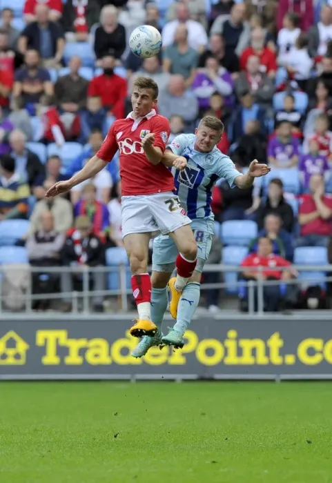 Framed Print : Battling for the Ball: Joe Bryan vs. Aaron Phillips - Sky Bet League One Clash at Ricoh Arena Framed Print : Battling for the Ball: Joe Bryan vs. Aaron Phillips - Sky Bet League One Clash at Ricoh Arena