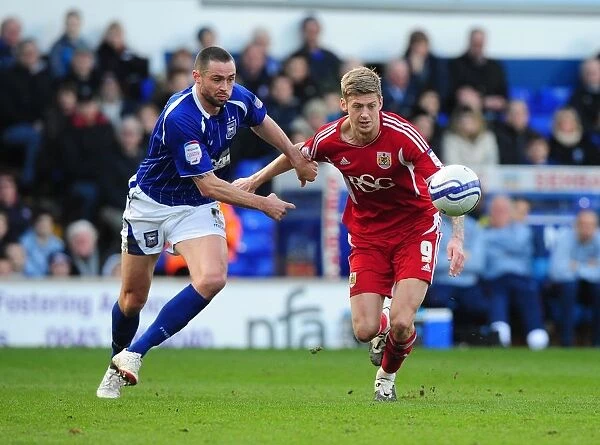 Battling for the Ball: Jon Stead vs. Damien Delaney, Ipswich Town vs. Bristol City Football Rivalry, March 2012