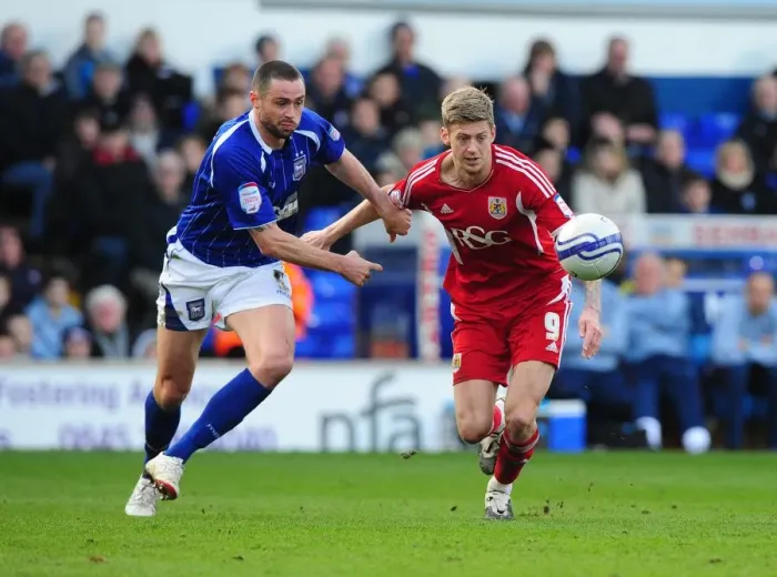 Framed Print : Battling for the Ball: Jon Stead vs. Damien Delaney, Ipswich Town vs. Bristol City Football Rivalry, March 2012