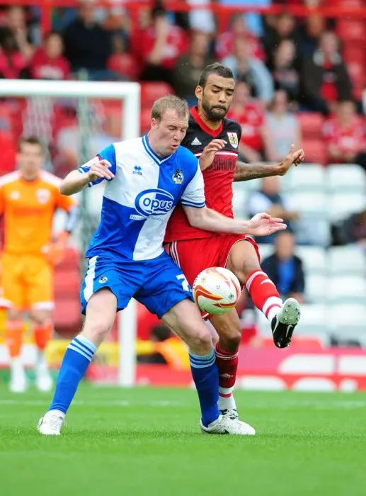 Framed Print : Battling for the Ball: Liam Fontaine vs. David Clarkson - Bristol City vs. Bristol Rovers, 2012 (Louis Carey Testimonial) Framed Print : Battling for the Ball: Liam Fontaine vs. David Clarkson - Bristol City vs. Bristol Rovers, 2012 (Louis Carey Testimonial)