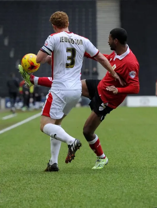 Framed Print : Battling for the Ball: Mark Little vs. Dean Lewington, Milk Cup Clash - Football Rivalry