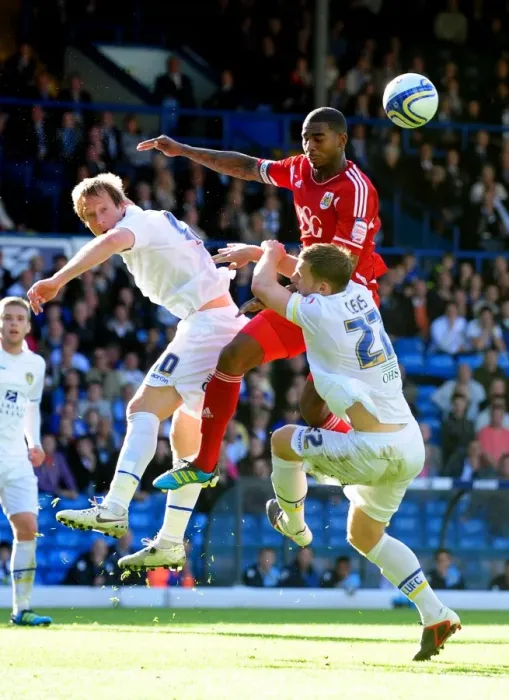 Framed Print : Battling for the Ball: Marvin Elliott vs. Becchio and Somma in the Intense 2011 League Cup Clash between Leeds United and Bristol City Framed Print : Battling for the Ball: Marvin Elliott vs. Becchio and Somma in the Intense 2011 League Cup Clash between Leeds United and Bristol City