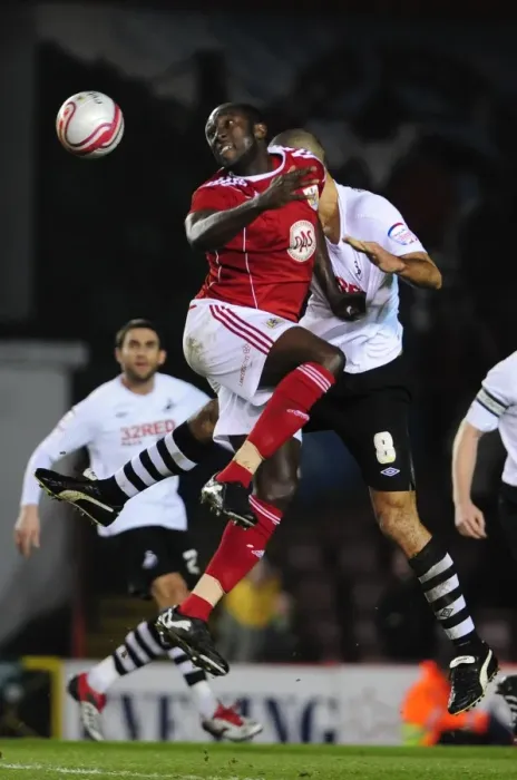 Framed Print : Battling for the Ball: Stewart vs. Pratley in the Intense Championship Clash between Bristol City and Swansea City (01 / 02 / 2011) Framed Print : Battling for the Ball: Stewart vs. Pratley in the Intense Championship Clash between Bristol City and Swansea City (01 / 02 / 2011)