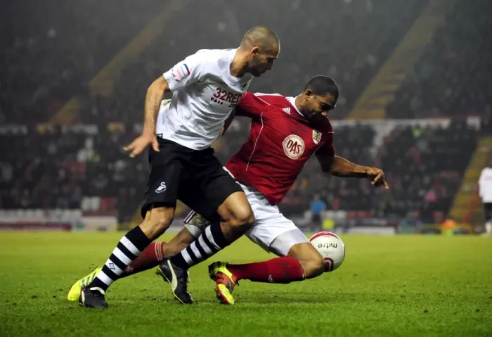 Framed Print : Battling for Championship Glory: Marvin Elliott vs. Darren Pratley (Bristol City vs. Swansea City, 2011)