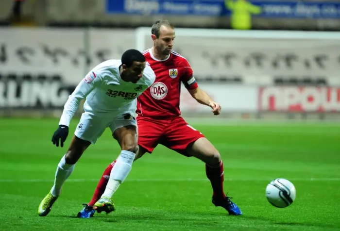 Framed Print : Battling for Championship Supremacy: Carey vs. Sinclair - Swansea City vs. Bristol City, 2010 Framed Print : Battling for Championship Supremacy: Carey vs. Sinclair - Swansea City vs. Bristol City, 2010